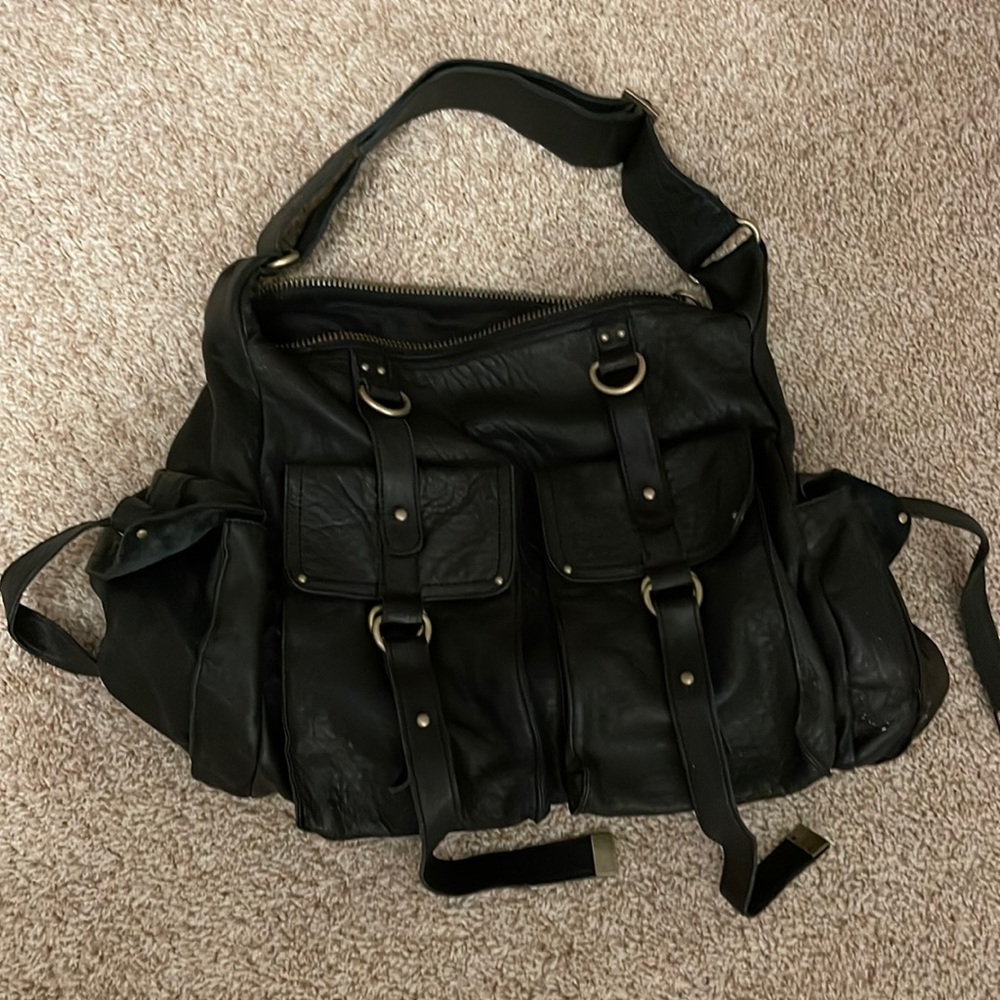 Leather bag with multiple pockets, utilitarian boho